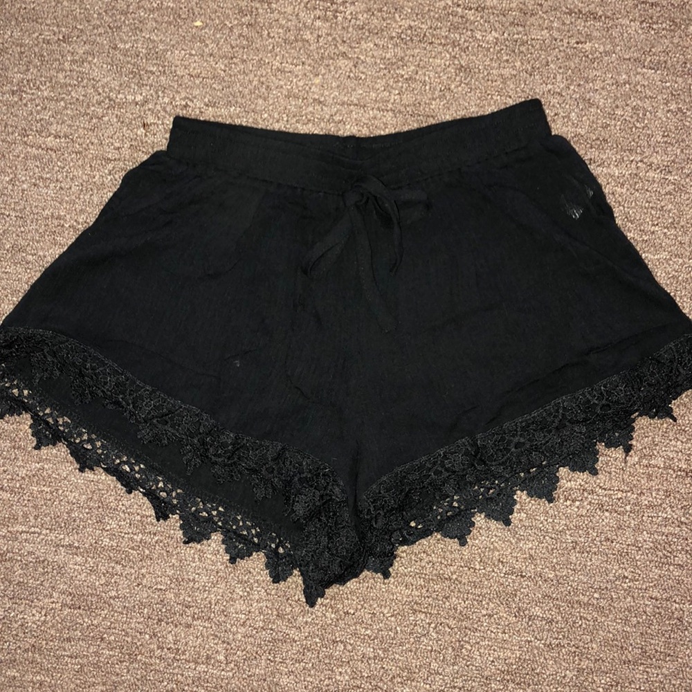 Black lace hemmed shorts